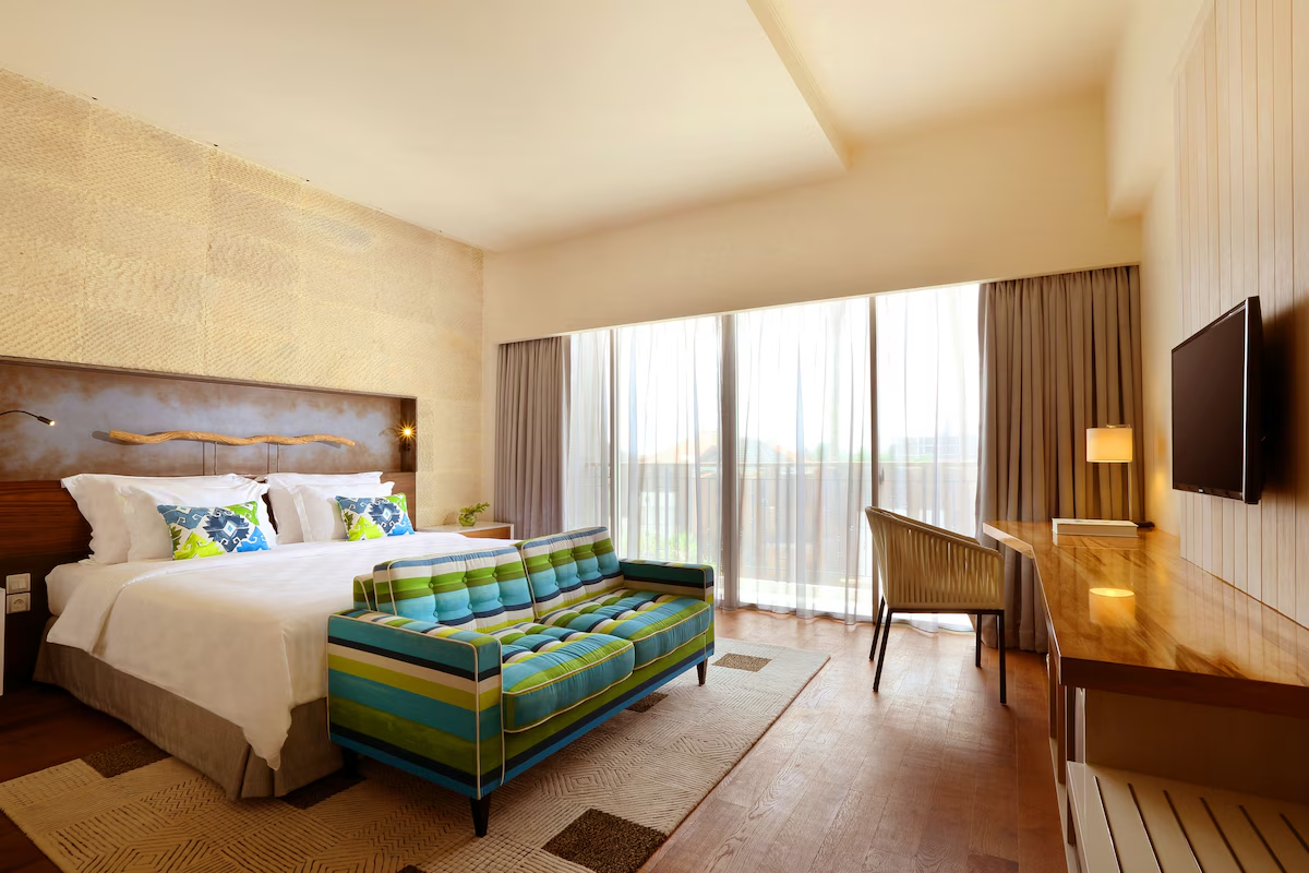 Spacious Bali resort room with balcony