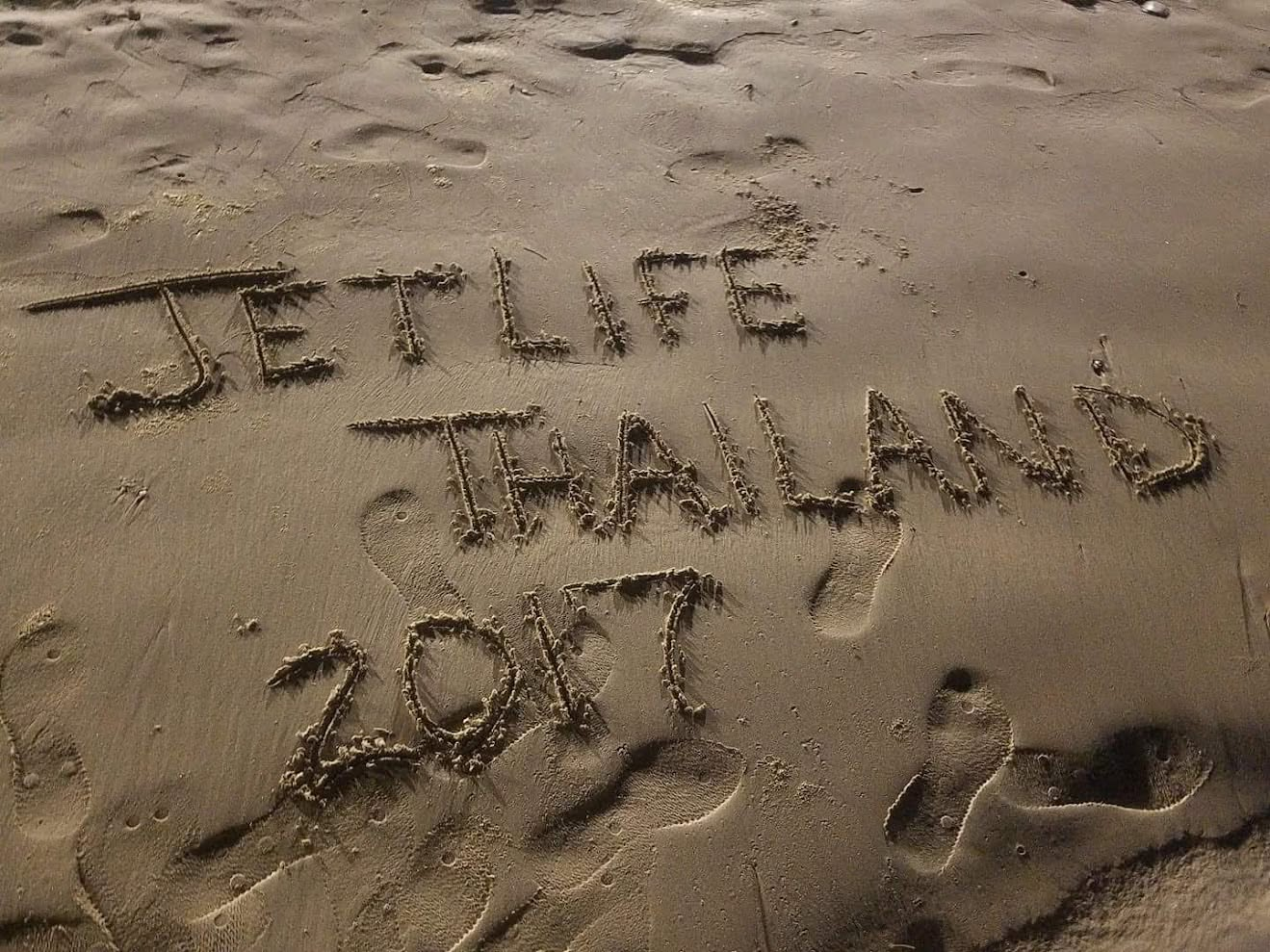JetLife Thailand 2027 written in the sand
